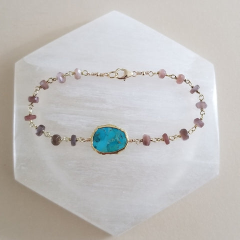 Handcrafted beaded bracelet featuring shimmering chocolate moonstone paired with bright turquoise stones, boho-chic style.