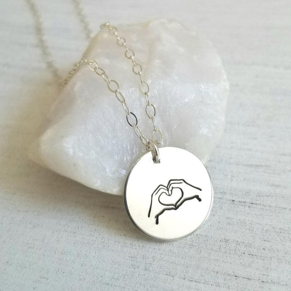 Heart hands necklace online