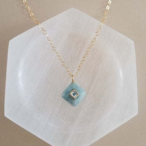 Delicate aquamarine pendant with white topaz inlay on a thin gold chain, dainty March birthstone necklace for women. Christmas gift idea for her.