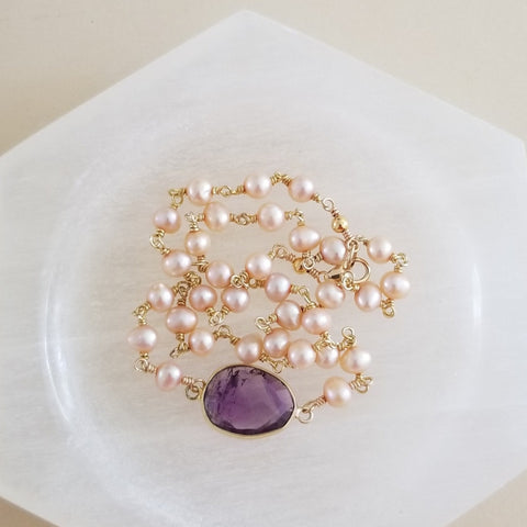 Handcrafted pearl and amethyst necklace in champagne and purple tones, feminine gemstone jewelry for everyday or formal wear.